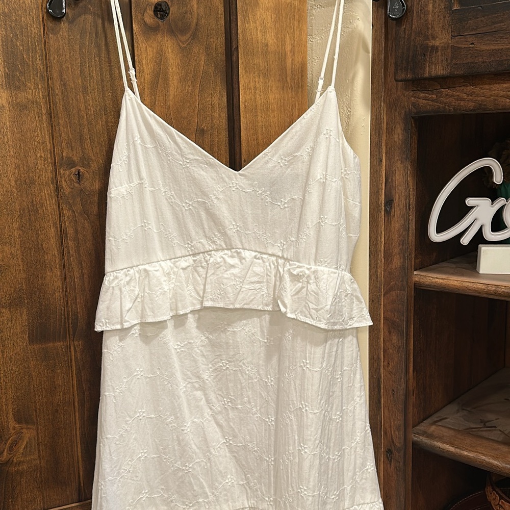 White Sleeveless Dress with Ruffle Detail
